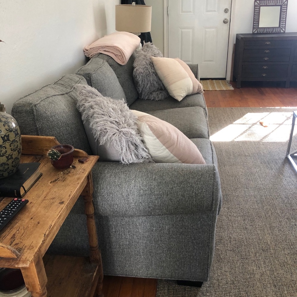 Used rooms to go gray couch. 2 & 3 seat couches
